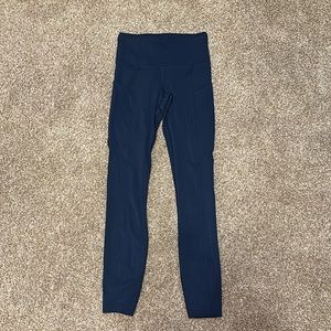 Fast and Free High-Rise Tight 25” Pockets.  True Navy size 2